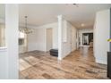 Formal dining room with hardwood floors and wainscoting at 159 Charles Farm Dr, Cleveland, NC 27013