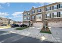 Townhome community featuring multiple units with parking at 1907 Catkin Ln, Charlotte, NC 28205