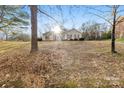 House exterior showcasing a large yard at 2411 Hamilton Mill Rd, Charlotte, NC 28270