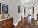 Bright hallway with hardwood floors and access to other rooms at 301 W 10Th St # 205, Charlotte, NC 28202