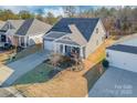 Single-Gathering home with driveway and landscaping at 5158 Turtle Creek Dr, Denver, NC 28037