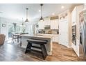 Modern kitchen with granite countertops and stainless steel appliances at 5158 Turtle Creek Dr, Denver, NC 28037