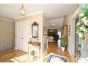 Bright and spacious entryway with hardwood floors and coat closet at 2608 Innsbrook Rd, Charlotte, NC 28226