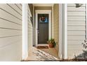 Inviting front entry with a wreath and a welcoming doormat at 1025 Lake Como Dr, Monroe, NC 28110