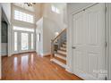 Hardwood floors, staircase, and a view to the front door at 2420 Valelake Rd, York, SC 29745