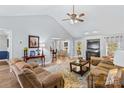 Spacious living room with vaulted ceiling, fireplace, and ample seating at 2740 Hill Top Dr, Salisbury, NC 28147