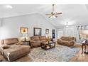 Relaxing living room featuring a cozy fireplace and hardwood floors at 2740 Hill Top Dr, Salisbury, NC 28147