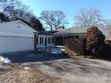 Attached garage with driveway and backyard access at 352 7Th Nw St, Hickory, NC 28601