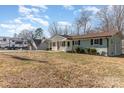 House with RV parking and spacious yard at 102 Hickory St, Locust, NC 28097