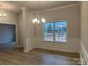 Formal dining room with hardwood floors and wainscoting at 104 Kerr Walk Dr # 14, Statesville, NC 28677