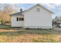 Side view of a white house with a grassy yard at 207 Faulkner St, Clover, SC 29710