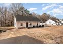 House exterior with driveway and yard, located in a residential neighborhood at 225 Mighty Joe Trl, York, SC 29745