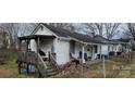 White sided house with porch and small yard at 308 S High St, Lincolnton, NC 28092