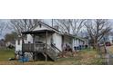 White sided house with porch and small yard at 308 S High St, Lincolnton, NC 28092