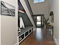 Functional entryway with built-in bench, shelving, and coat hooks at 373 Battery Cir, Clover, SC 29710