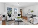 Light-filled living room with hardwood floors and stylish seating at 5113 Grice Ct, Charlotte, NC 28210