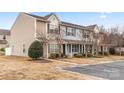 Three-unit townhome building with landscaping and parking at 611 Cahill Ln, Fort Mill, SC 29715