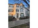 Inviting three-story home with attractive landscaping at 9323 Lenox Pointe Dr, Charlotte, NC 28273