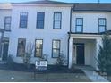 Two-story home with white siding and black trim at 10028 Nw Trailhead Nw Way, Huntersville, NC 28078