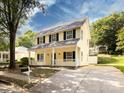 Two-story house with driveway and landscaping at 104 Pratt St, Belmont, NC 28012