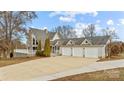 A-frame home with a large deck and three-car garage at 9175 Cox Rd, Mount Pleasant, NC 28124