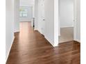 Bright hallway with hardwood floors leading to various rooms at 1058 Horizon Ave, Chester, SC 29706