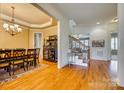 Formal dining room with hardwood floors and chandelier at 1257 Stacey Ln, Indian Land, SC 29707