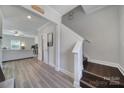 Modern staircase leading to the upper level at 179 Tanner Loop, Troutman, NC 28166