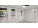 Bright living room with hardwood floors and a ceiling fan at 4421 Gum St, Charlotte, NC 28208