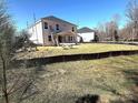 Expansive backyard shows new construction home with room to personalize the outdoor living space at 9957 Cask Way, Huntersville, NC 28078