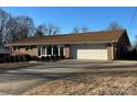 Ranch house with a large driveway and mature trees at 108 Greenview Dr, Kannapolis, NC 28081