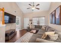 Spacious living room with sectional sofa, fireplace and hardwood floors at 1550 Maypine Commons Way, Rock Hill, SC 29732