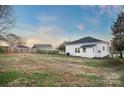 Large backyard with a partially visible house at 203 Linwood Rd, Kings Mountain, NC 28086