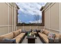 Spacious rooftop deck with comfortable seating and city views at 211 Harbour Place Dr, Davidson, NC 28036