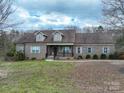 Brick ranch house with attached garage and large yard at 2610 Lucy Short Cut Rd, Marshville, NC 28103