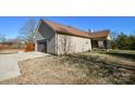 Brown vinyl-sided home with attached garage and screened porch at 2610 Lucy Short Cut Rd, Marshville, NC 28103