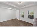 Bright foyer with hardwood floors and neutral walls at 3126 Elmwood Dr, Monroe, NC 28110