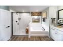 Spa-like bathroom with soaking tub and walk-in shower at 7657 Bainbridge Rd, Sherrills Ford, NC 28673