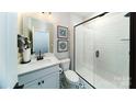 Bathroom with single vanity and walk-in shower at 7657 Bainbridge Rd, Sherrills Ford, NC 28673