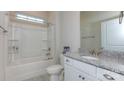 Clean bathroom with granite countertop, bathtub, and shower at 7673 Bainbridge Rd, Sherrills Ford, NC 28673