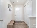 Bright entryway with wood-look floors and built-in storage at 107 Jeffrey St, Fort Mill, SC 29715