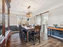 Bright dining room with a large table and sliding barn door at 10705 Whitfield Ridge Dr, Charlotte, NC 28277