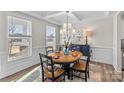 Bright dining room featuring a charming table setting and decorative accents at 2151 Black Forest Cv, Concord, NC 28027