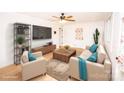Bright, staged living room with hardwood floors, modern furniture, and stylish decor at 5020 Foster Rd, Cleveland, NC 27013
