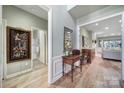 Bright entryway with hardwood floors and views into the living areas at 55327 Derringer Ave, Fort Mill, SC 29707
