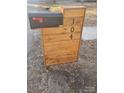Custom wooden mailbox with house number at 104 Rice St, Kannapolis, NC 28081