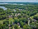 Community view showcasing houses, golf course, and lake access at 92 Heritage Dr, Clover, SC 29710