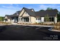 Community clubhouse with ample parking and landscaping at 1031 Bourn Ln, Waxhaw, NC 28173