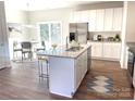Modern kitchen with island, stainless steel appliances, and granite countertops at 115 Venus Ave, Gastonia, NC 28052