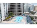 Rooftop pool with lounge chairs and city views at 333 Trade W St # 603, Charlotte, NC 28202